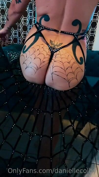 Danielle Colby - Spider Web Tattoo