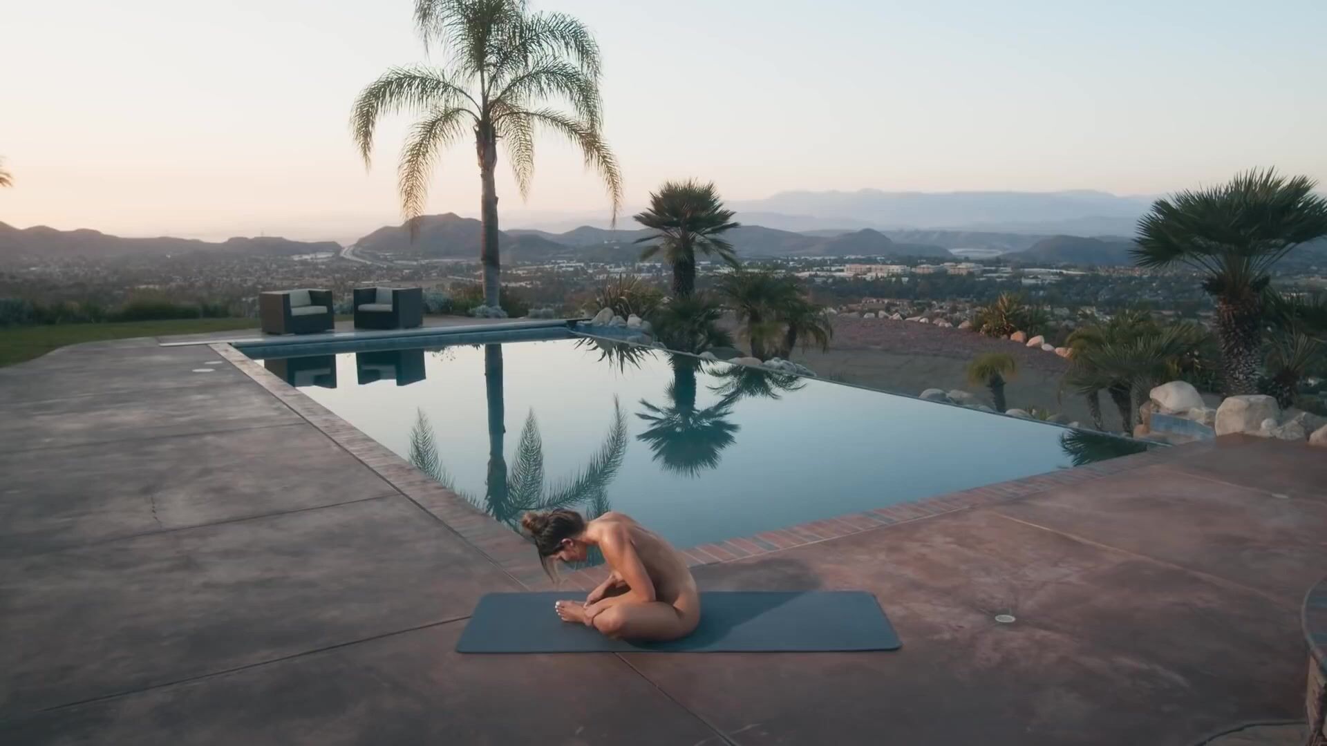 Naked yoga by the pool  for educational purposes